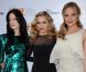 La brune Andrea Riseborough, la star Madonna et la blonde Abbie Cornish à Toronto pour présenter W.E. le 12 septembre 2011. 