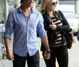 Kate Winslet et son nouveau chéri Ned Rockroll, neveu de Richard Branson, arrivent à l\'aéroport de San Francisco le 14 octobre 2011.
