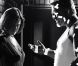 Carla Gugino et Mickey Rourke dans Sin City.