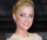 Amber Heard pour présenter Rhum Express à Londres, le 3 novembre 2011.