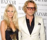 Poppy Delevingne et Peter Dundas lors de la soirée Harper's Bazaar à Londres, le 7 novembre 2011