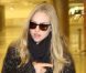 Amanda Seyfried arrive à l'aéroport de Miami le 10 novembre 2011