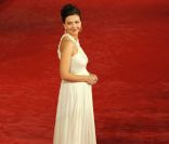 Maggie Gyllenhaal : une petit cachottière lors du Festival du film de Rome le 28 octobre 2011