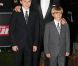 David Beckham avec ses fils Brooklyn et Romeo sur le tapis rouge de la soirée A Night of Heroes pour les Sun Military Awards, à l'Imperial War Museum de Londres, le 19 décembre 2011.
