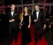 Le prince William, la duchesse Catherine et le prince Harry sur le tapis rouge de la soirée A Night of Heroes pour les Sun Military Awards, à l'Imperial War Museum de Londres, le 19 décembre 2011.