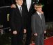 David Beckham avec ses fils Brooklyn et Romeo sur le tapis rouge de la soirée A Night of Heroes pour les Sun Military Awards, à l'Imperial War Museum de Londres, le 19 décembre 2011.