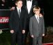 David Beckham avec ses fils Brooklyn et Romeo sur le tapis rouge de la soirée A Night of Heroes pour les Sun Military Awards, à l'Imperial War Museum de Londres, le 19 décembre 2011.