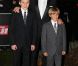 David Beckham avec ses fils Brooklyn et Romeo sur le tapis rouge de la soirée A Night of Heroes pour les Sun Military Awards, à l'Imperial War Museum de Londres, le 19 décembre 2011.