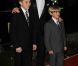 David Beckham avec ses fils Brooklyn et Romeo sur le tapis rouge de la soirée A Night of Heroes pour les Sun Military Awards, à l'Imperial War Museum de Londres, le 19 décembre 2011.