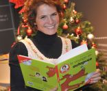 Maureen Dor lit des contes pour enfants au Carré d'Encre, librairie parisienne, le vendredi 23 décembre 2011.