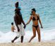Fous de bonheur, Djimon Hounsou, sa compagne Kimora Lee et leur fils Kenzo, en vacances à St Barth le 25 décembre 2011