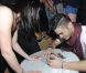 Baptiste Giabiconi signe des autographes après son concert au Metropolis à Rungis le 14 janvier 2012