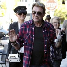 Johnny Hallyday et Laeticia à Los Angeles, le 8 février 2012. Mamie Rock, la grand-mère de Laeticia, les accompagne. <br />