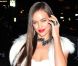 La sublime Irina Shayk arrive dans un total look blanc au Crimson pour la soirée Sports Illustrated à New York. Le 14 février 2012.