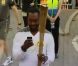 Will.i.am porte la flamme olympique dans les rues de Tauton dans le Somerset le 21 mai 2012