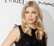 Fergie, très chic dans une robe noire Calvin Klein Collection accessoirisée de souliers de sa marque éponyme, assistait au troisième gala Inspiration de l'amfAR à la New York Public Library. New York, le 7 juin 2012.