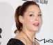 Rose McGowan, très en beauté pour la troisième édition du gala Inspiration de l'amfAR à la New York Public Library. New York, le 7 juin 2012.