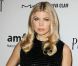 Fergie, très chic dans une robe noire Calvin Klein Collection accessoirisée de souliers de sa marque éponyme, assistait au troisième gala Inspiration de l'amfAR à la New York Public Library. New York, le 7 juin 2012.