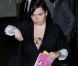 Isabella Cruise quitte son hôtel de New York le 12 juin.