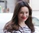 Photo exclusive : Kelly Brook, souriante dans les rues de Londres, le 14 juin 2012.