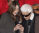 Carla Bruni et Karl Lagerfeld complices à l'Élysée où le président a décoré onze personnalités du monde des arts et du spectacle, le 14 mars 2012.