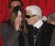 Carla Bruni et Karl Lagerfeld complices à l'Élysée où le président a décoré onze personnalités du monde des arts et du spectacle, le 14 mars 2012.