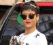 Rihanna semble de bonne humeur en arrivant au Gansevoort, hôtel où elle réside pendant son passage à New York. Le 1er octobre 2012.