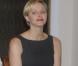 La princesse Charlene de Monaco rencontrant des athlètes des Jeux olympiques spéciaux, à Varsovie, le 17 octobre 2012, dans le cadre de sa visite officielle avec le prince Albert II.