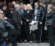 Sortie d'église émouvante pour les proches de Frank Alamo après la cérémonie en l'église de Saint-Germain-des-Prés à Paris, le 18 octobre 2012.