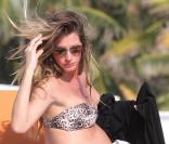 Gisele Bündchen, enceinte, dévoile son petit ventre rond en bikini léopard sexy