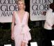 Charlize Theron radieuse lors des Golden Globes en tenue Dior