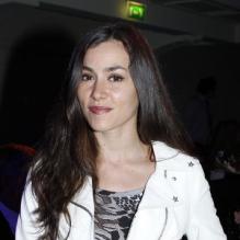 Olivia Ruiz durant le défilé de haute couture de Jean Paul Gaultier à Paris le 6 juillet 2011.