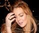 Lindsay Lohan, fatiguée, quitte le restaurant Cipriani à Londres, le 30 décembre 2012.