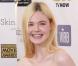 Elle Fanning, habillée d'une robe et de sandales Chanel collection prêt-à-porter printemps-été 2013, assiste à la 18e cérémonie des Critics' Choice Movie Awards au Barker Hangar. Santa Monica, le 10 Janvier 2013.