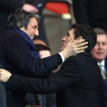 Richard Anconina et Marc Lavoine lors du match de Ligue des champions entre le PSG et Valence (1-1) au Parc des Princes à Paris le 6 mars 2013