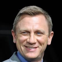 Daniel Craig tout sourire au Salon de l'automobile de New York, le 26 mars 2013.