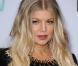 Fergie et Kylie Minogue, très classes sur tapis rouge, leurs carrières célébrées
