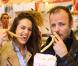 Alice David et Pierre-Francois Martin Laval savourent quelques churros à la Foire du Trône, Paris, le 5 mai 2013.