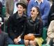 Pierre Niney et sa compagne Natasha Andrews  - finale opposant Rafael Nadal à David Ferrer au tournoi de Roland-Garros, à Paris le 9 juin 2013.   