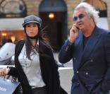 Flavio Briatore et sa femme  Elisabetta Gregoraci traversant la place Vendôme (Paris)