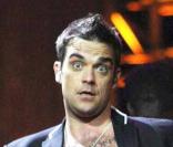 Robbie Williams a offert un strip tease à Elton John pour ses 60 ans