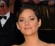Marion Cotillard, à Hollywood, dans une longue robe Nina Ricci.