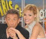 Michelle Hunzinker et Ezio Greggio s'éclatent sur le plateau de leur émission  Striscia La Notizia . 14/01/09
