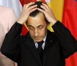 Nicolas Sarkozy et Angela Merkel au sommet de Berlin. La crise lui donne mal à la tête ! 22/02/09