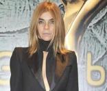 Carine Roitfeld, rédactrice en chef de  Vogue  (édition française) à la Fashion Week milanaise, pendant la soirée Cavalli 
