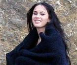Megan Fox en plein shooting photo sur la plage