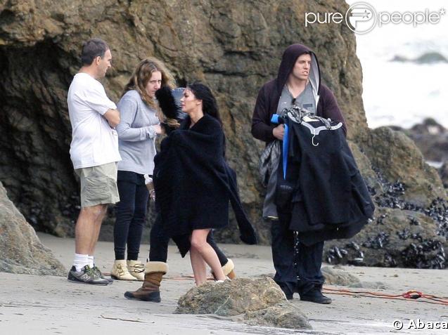 Megan Fox en plein shooting photo sur la plage