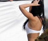 Megan Fox en plein shooting photo sur la plage