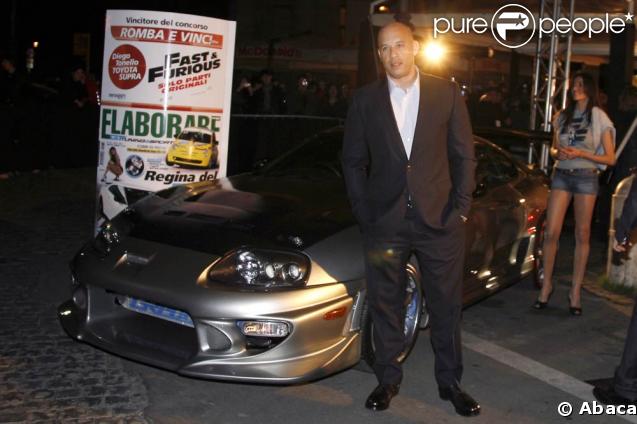 Vin Diesel... jamais très loin de sa voiture adorée... lors de l'avant-première de 