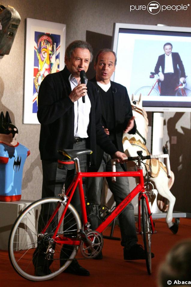 Michel Drucker et Laurent Baffie à la vente aux enchères, chez Sotheby's. 30/03/09